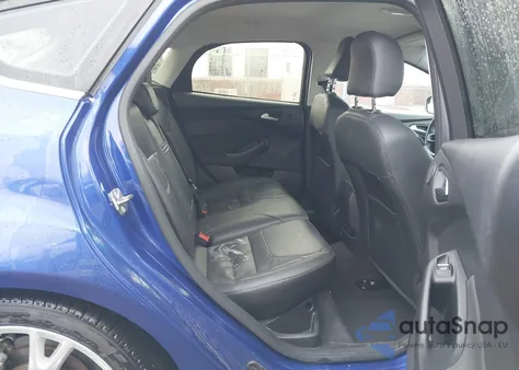 2015 Ford Focus Titanium z USA, uszkodzony, nr VIN 1FADP3N28FL268901